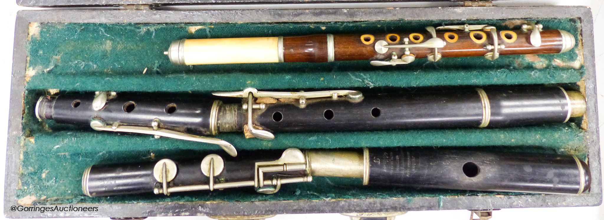 An incomplete Jerome Thibonville Lamey clarinet and an ivory and wood flute